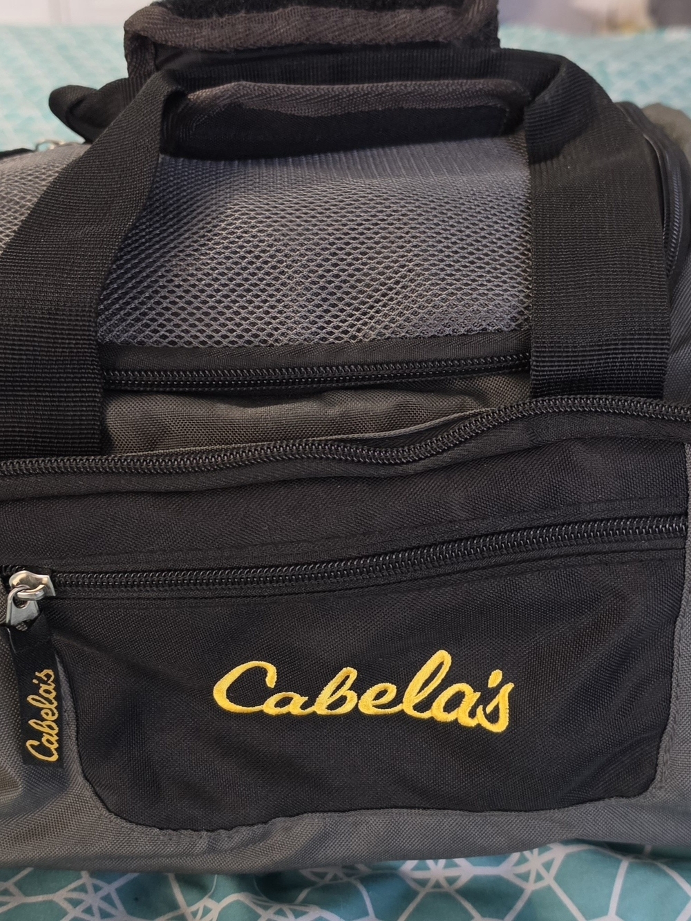 Cabela's Black and Gray Duffel with Yellow Logo